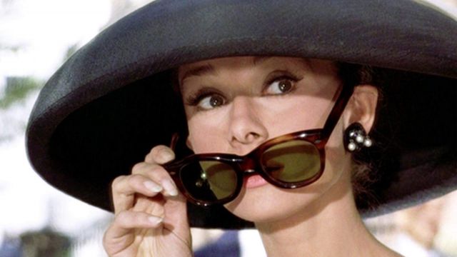 The sunglasses in tortoiseshell Oliver Goldsmith worn by Holly Golightly (Audrey Hepburn) in Breakfast at Tiffany's