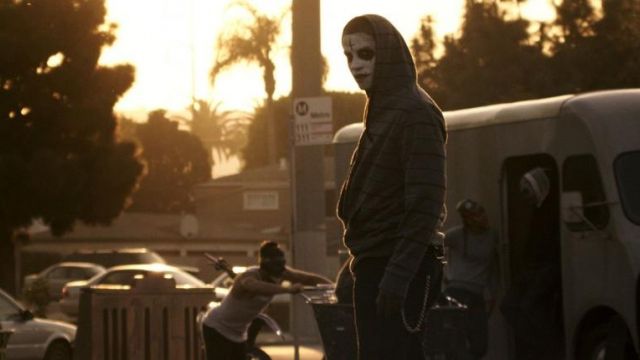 The hoody man painted up in The Purge : Anarchy