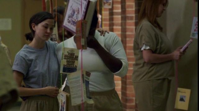 the book, the name is Archer by Ross Mcdonald view in orange is the new black