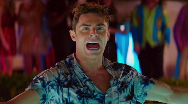 La chemise hawaïenne Yves Saint Laurent de Matt Brody (Zac Efron) dans Baywatch