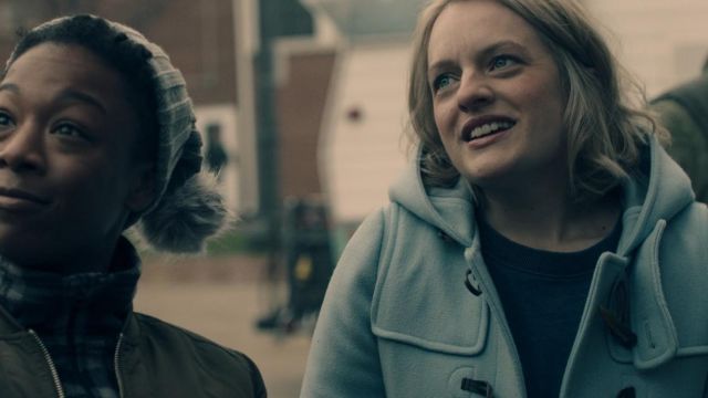 The blue duffle coat worn by June (Elisabeth moss) in the series The Handmaid's Tale (Season 1 Episode 5)