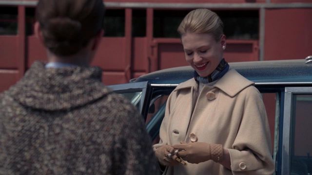The wool coat by Betty Draper (January Jones) in Mad Men S02E01