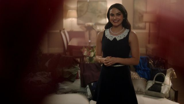 The black dress white collar of Veronica Lodge (Camila Mendes) in Riverdale S01E09