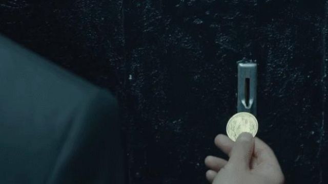 La pièce de monnaie en or utilisée par John Wick (Keanu Reeves) dans John Wick