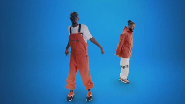 Sneakers orange and black Saucony Grid 9000 in the clip 1,2,3 Alpha Wann