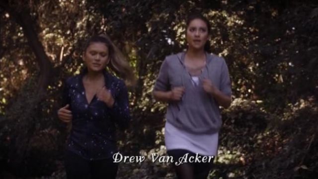 The pull to the laces of Emily (Shay Mitchell) in Pretty Little Liars