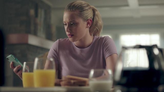 Gap Vin­tage wash crew­neck purple tee worn by Betty Cooper (Lili Reinhart) as seen in Riverdale S02E01
