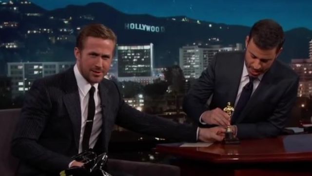 The replica of an Oscar that is offering Ryan Gosling on Jimmy Kimmel in Jimmy Kimmel Live