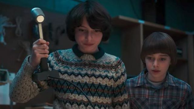 The sweater geometric patterns Mike Wheeler (Finn Wolfhard) in Stranger Things season 2