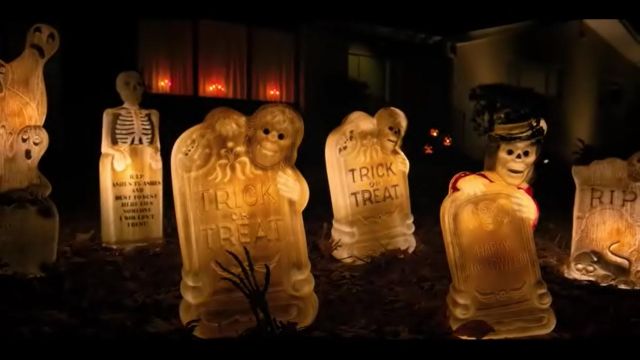 The graves light for Halloween outside the house of Dustin Henderson (Gaten Matarazzo) in Stranger Things