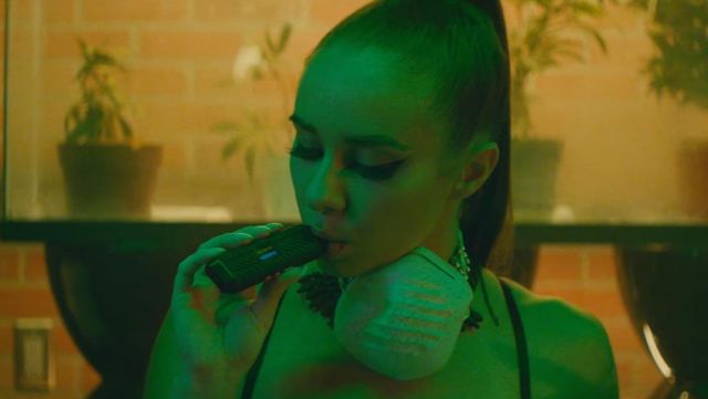 The spray MigVapor in the clip Phone Jumpin Dave East feat. Wiz Khalifa