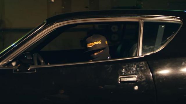 The black hat KandyPens in the clip It's secured DJ Khaled ft. Nas, Travis Scott