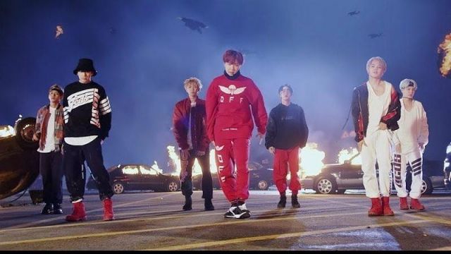 The hoodie-red oversized of Jeon Jungkook of Bangtan Boys (BTS) in the Mic Drop of the BTS