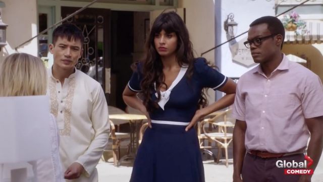 The blue dress navy ModCloth of Ms. Al-Jamil (Jameela Jamil) in The Good Place S02E10