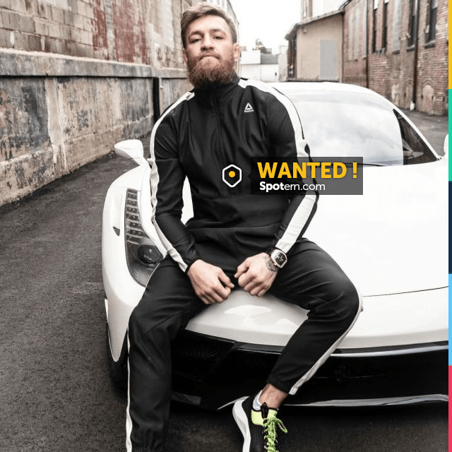 The tracksuit black with white stripe 