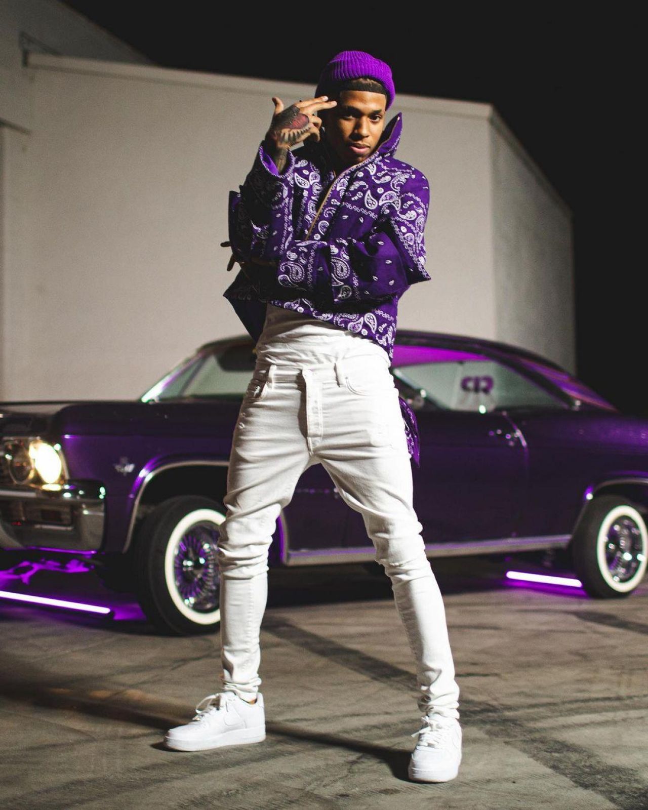 Purple jacket with white pattern. worn by NLE Choppa on the account Instagr...