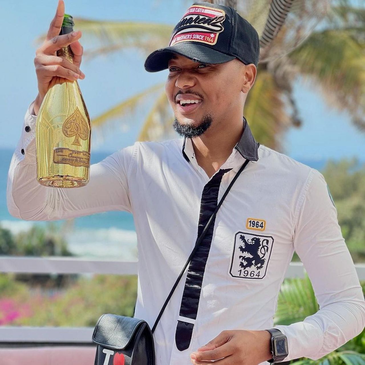 White and black shirt worn by Shaun Stylist on his Instagram account