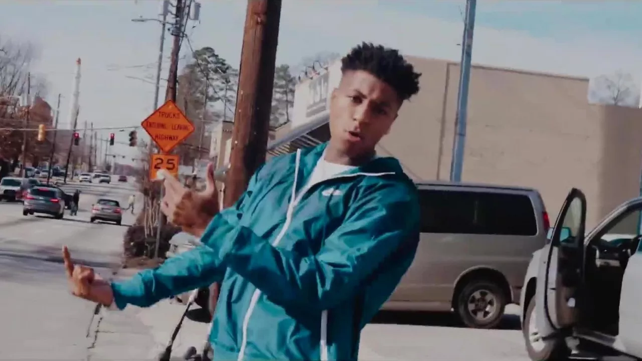 Green Nike Windrunner Jacket worn by YoungBoy Never Broke Again in Kick