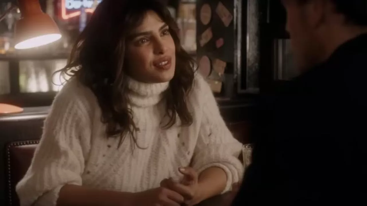 White wool turtleneck sweater worn by Mira Ray (Priyanka Chopra) as