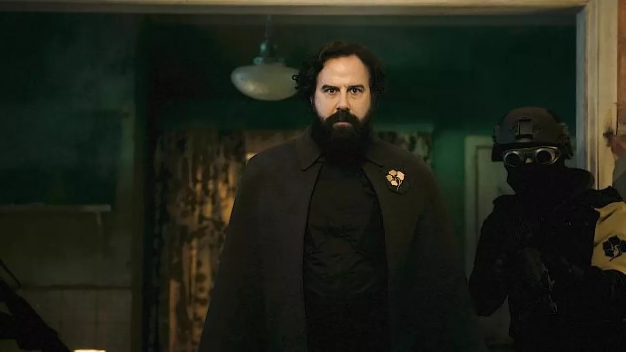 Long coat worn by Glen Van Der Koy (Brett Gelman) as seen in Boy Kills