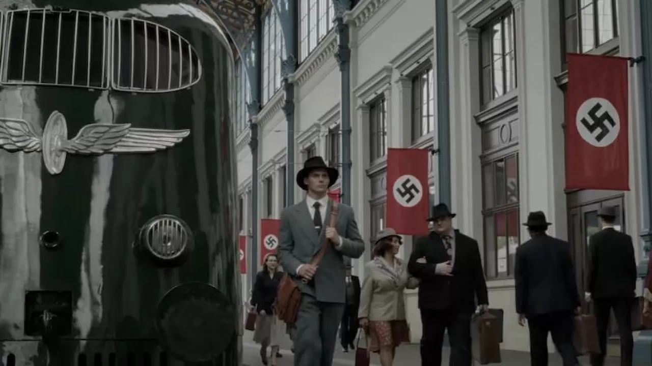 Leather Messenger Bag worn by Elder Seibold (Paul Wuthrich) as seen in