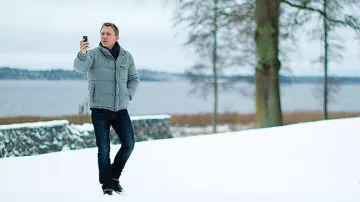 The grey down jacket worn by Mikael Blomkvist (Daniel Craig) in the movie Millennium: The Men Who Didn't Like Women