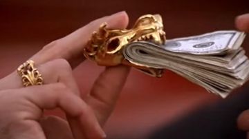 Money clip "Dragon Head" of Castor Troy (Nicolas Cage) in Volte-Face