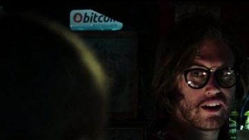 El letrero iluminado de Bitcoin en Deadpool