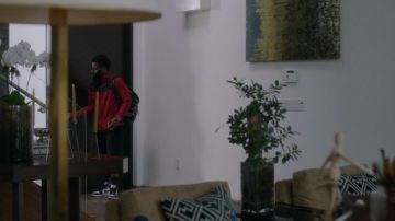 The jacket red and black Nike Ricky Jerret (John David Washington) in Ballers