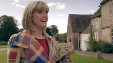Agatha Raisin Looks: Ashley Jensen wears a plaid jacket in Season 1 Episode 1