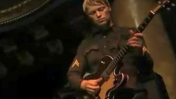 The military jacket of the guitarist of Cake for the live I Will Survive
