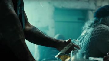 The bottle of alcohol drunk by Arthur Curry / Aquaman (Jason Momoa) in the Justice League