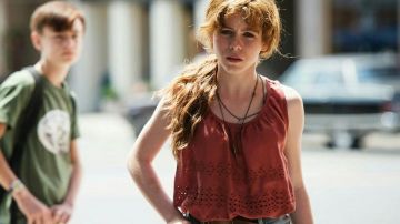 Red Tank with holes worn by Beverly Marsh (Sophia Lillis) as seen in It