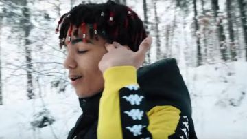 Le le blouson jaune et noir Kappa de H-Lo dans son clip En Effet