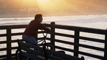 Red pullover worn by Jo­shua Cody aka "J" (Finn Cole) as seen in Ani­mal King­dom S01E01