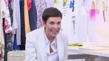 Le chemisier blanc porté par Cristina Cordula dans Les reines du shopping du 31 août 2018