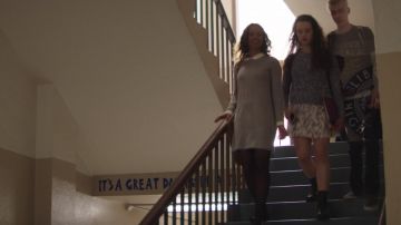 The dress gray long sleeve with white collar worn by Jessica Davis (Alisha Boe) in 13 Reasons Why S01E02