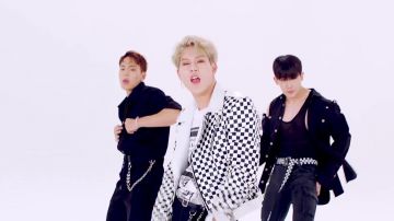 The leather jacket with checkerboard Jooheon in the clip Livin' It Up Monsta X