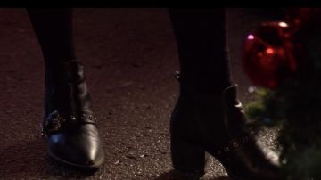 The black boots worn by Abby (Kat Graham) in the movie the Holiday Calendar