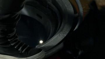 The black shoes of Jonas Taylor (Jason Statham) in waters