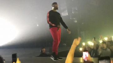 Le pull porté par Damso dans la vidéo Entrée + Feu de bois (LIVE Galaxie Amnéville)