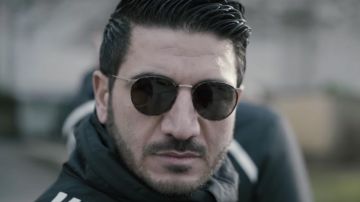 les lunettes de soleil de Dry dans son clip La rue