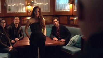 Strapless pantsuit worn by Maddie (Inbar Lavi) as seen in Imposters S01E09