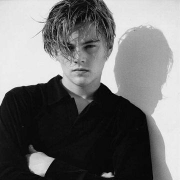 Black polo worn by Leonardo DiCaprio in an old photoshoot