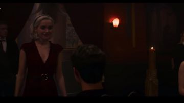 The red dress and belt worn by Sabrina Spellman (Kiernan Shipka) in The new adventures of Sabrina S02E03