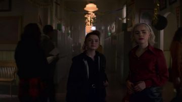The red shirt worn by Sabrina Spellman (Kiernan Shipka) in The New Adventures of Sabrina S02E06