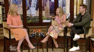 The sweater orange worn by Laura Linney on the set of Live with Kelly and Ryan on July 1, 2019