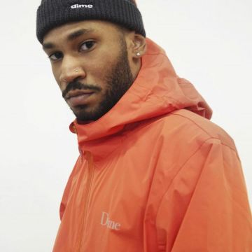 The jacket waxed orange Dime worn by Kay Tranada on his account Instagram @kaytranada