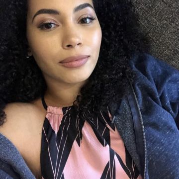 Pink top worn by Madeleine Mantock (Macy Vaughn in Charmed) on Instagram