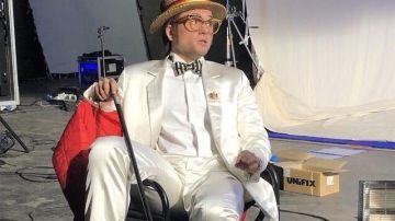Tuxedo white satin jacket worn during "I'm Still Standing" by Elton John (Taron Egerton) in Rocketman